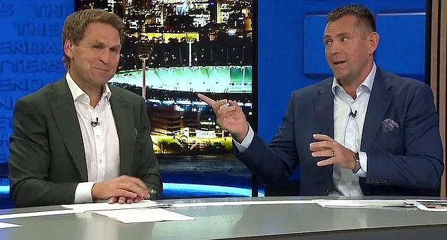 97575811 14637275 AFL Greats Luke Hodge And Kane Cornes Have Collided In Tense Sce M 15 1745365287057